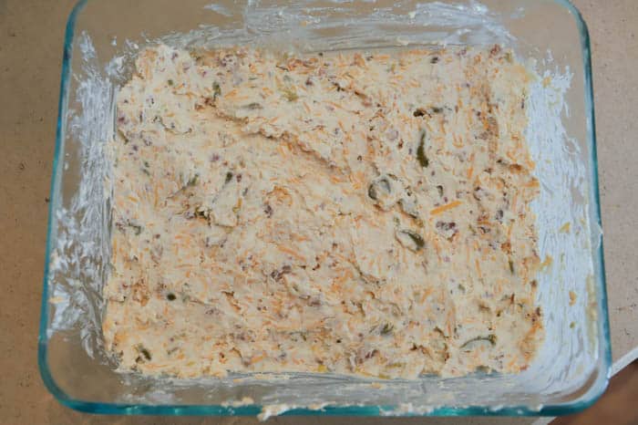 bottom layer of Jalapeno Popper Dip in casserole dish
