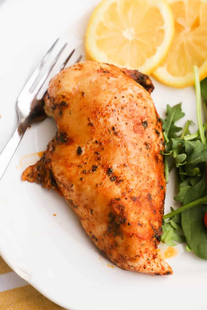 lemon pepper chicken on a white plate