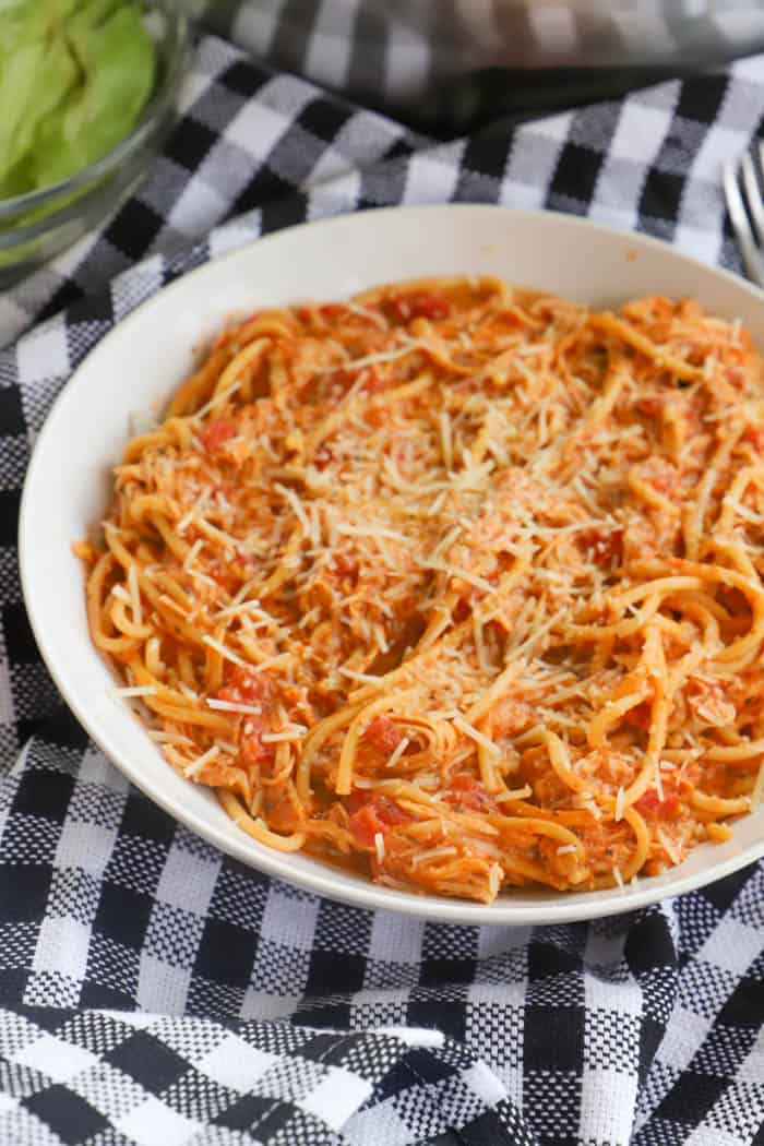 Slow Cooker Creamy Tomato Chicken Spaghetti in a white bowl