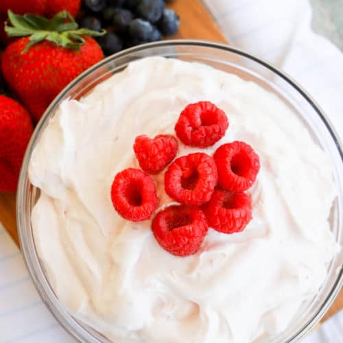 Raspberry Fruit Dip with fresh raspberries on top