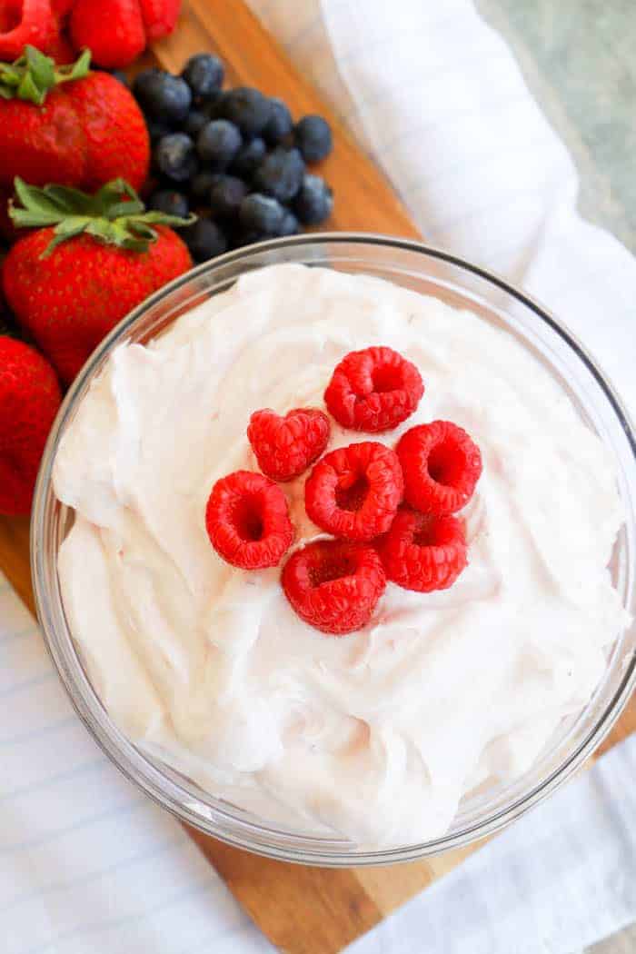 Raspberry Fruit Dip with fresh raspberries on top