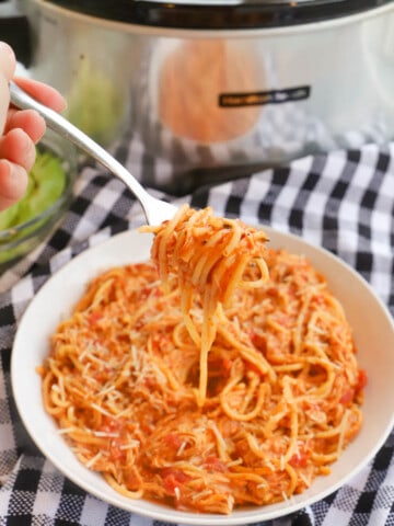 Slow Cooker Creamy Tomato Chicken Spaghetti on a fork