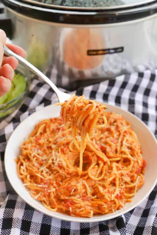 Slow Cooker Creamy Tomato Chicken Spaghetti on a fork