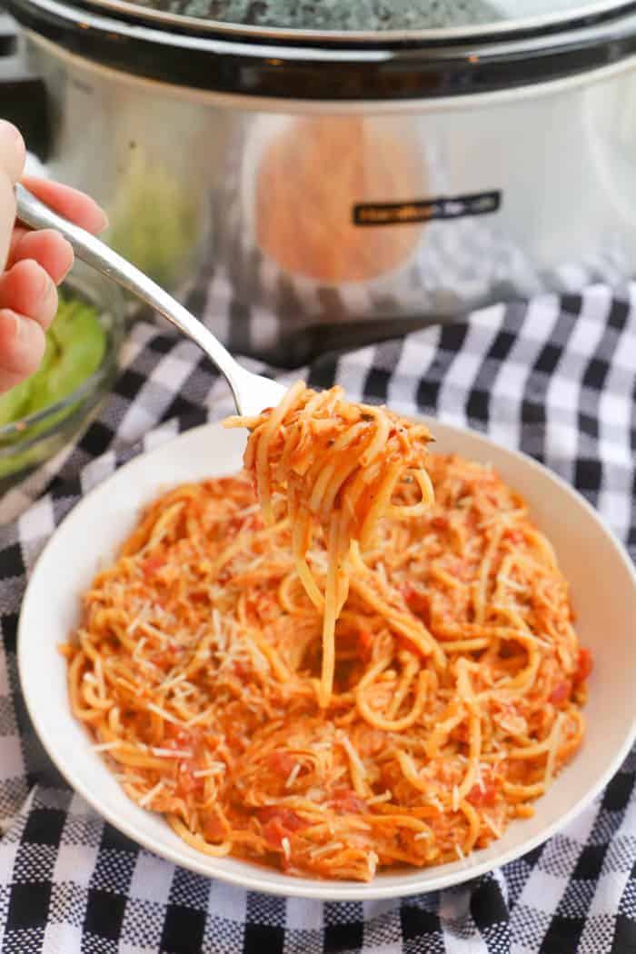 Slow Cooker Creamy Tomato Chicken Spaghetti on a fork