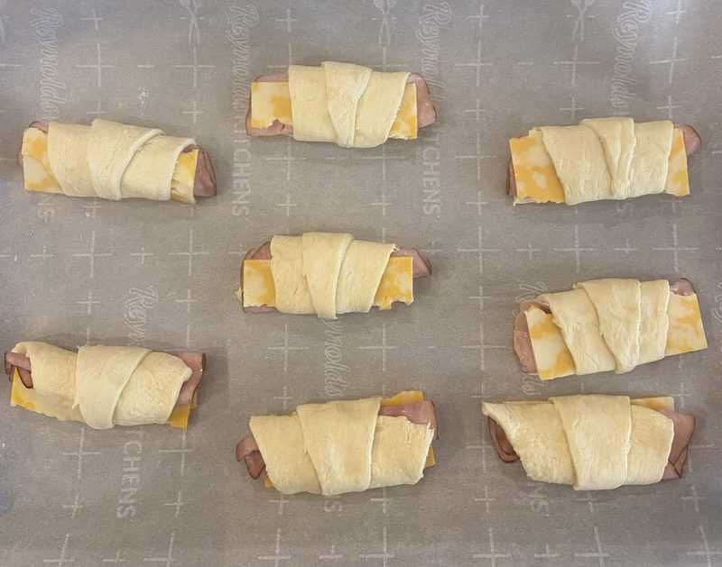 preparing Ham and Cheese Crescents before baking
