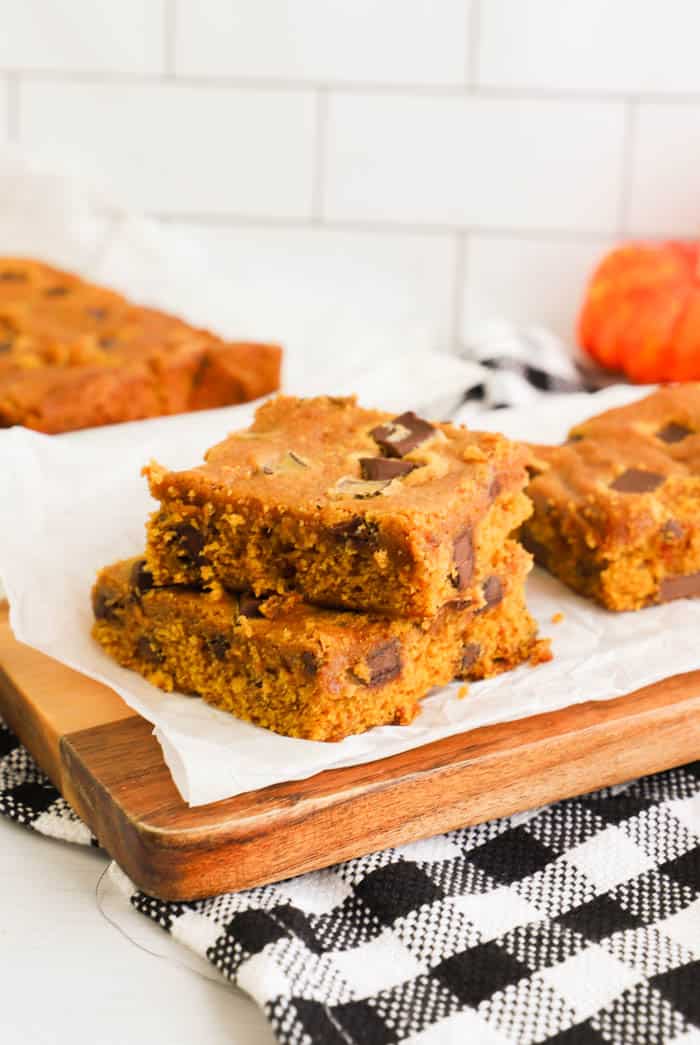 Chocolate Chip Pumpkin Bars slice and placed on cutting board