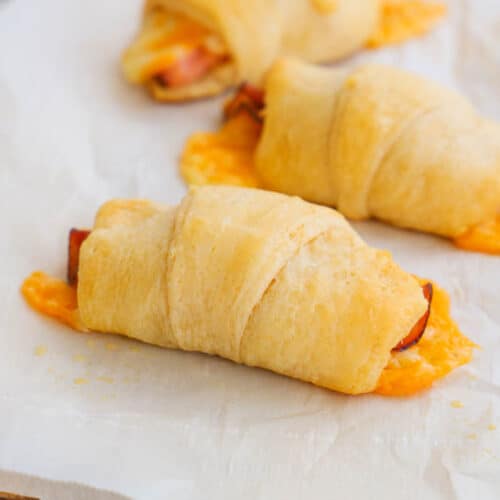 Ham and Cheese Crescents on a cutting board