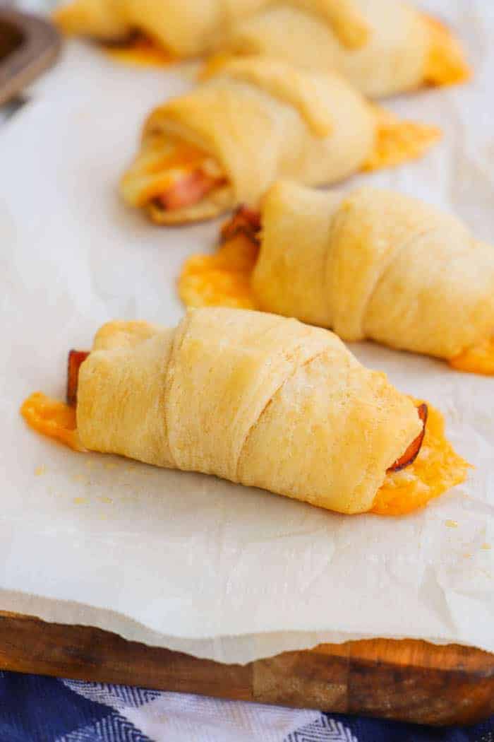 Ham and Cheese Crescents on a cutting board