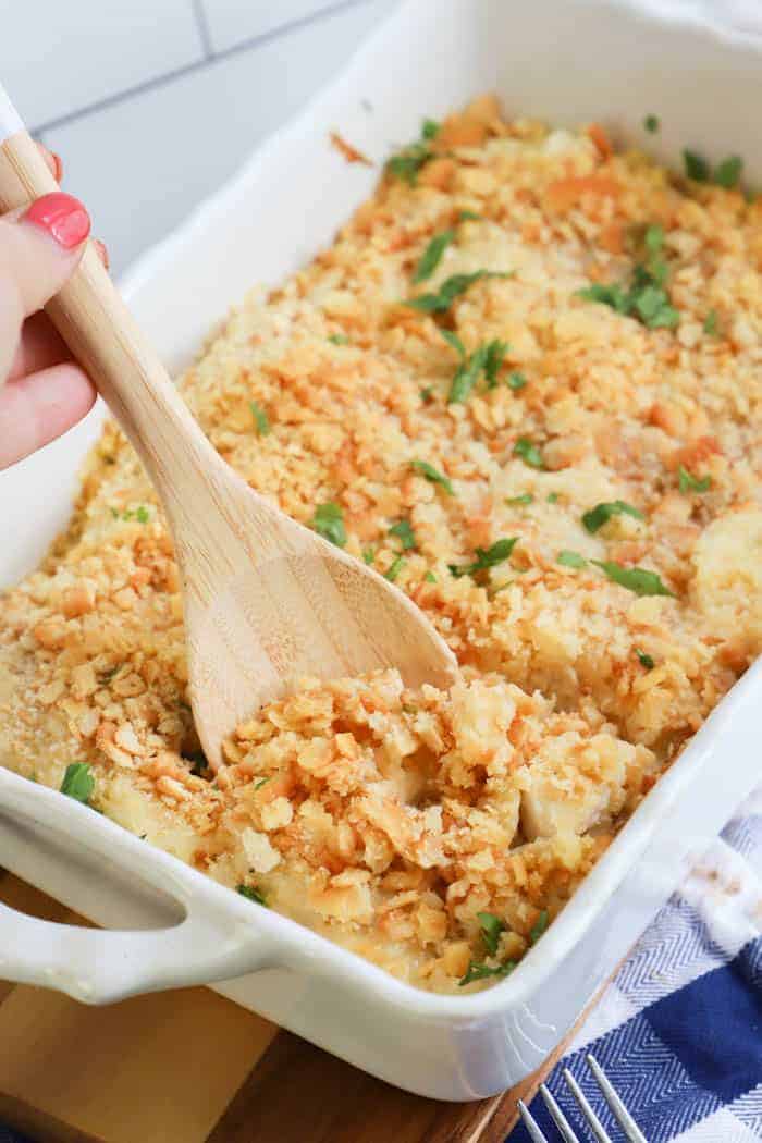 Cream Cheese Ritz Cracker Casserole on a wooden spoon