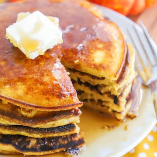 Pumpkin Pancakes on a plate with butter