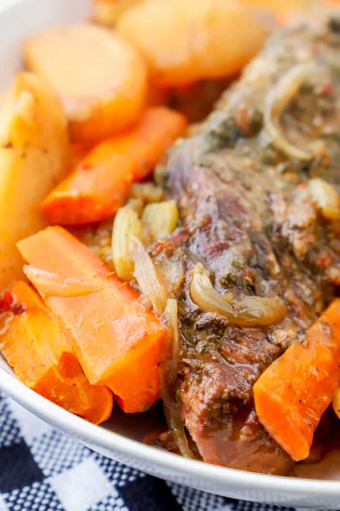 carrots and potatoes in a white bowl with roast