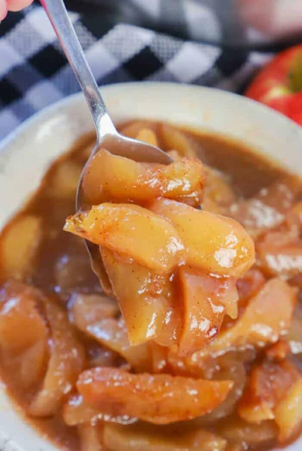 Slow Cooker Fried Apples on a spoon