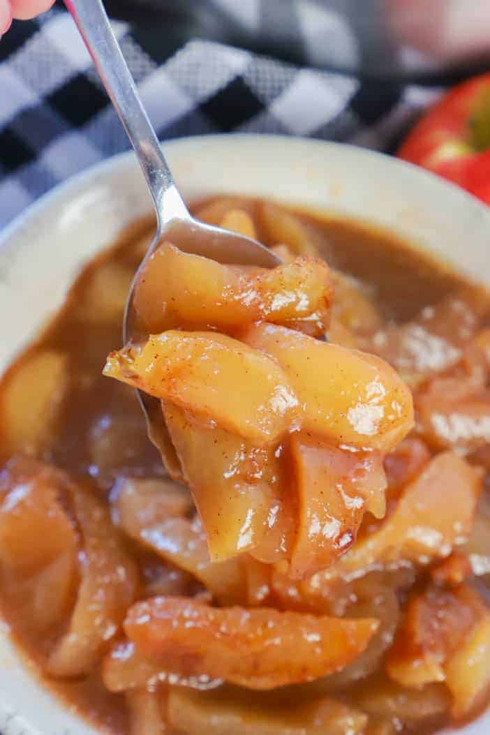 Slow Cooker Fried Apples on a spoon