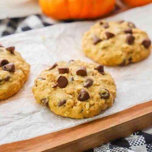 Pumpkin Oatmeal Chocolate Chip Cookie on a wooden cutting board