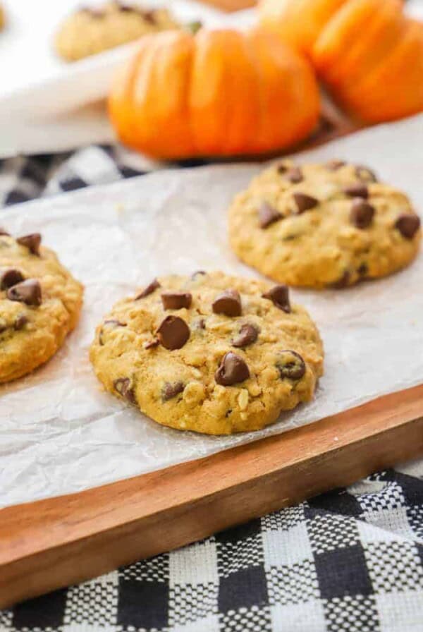 Pumpkin Oatmeal Chocolate Chip Cookie on a wooden cutting board