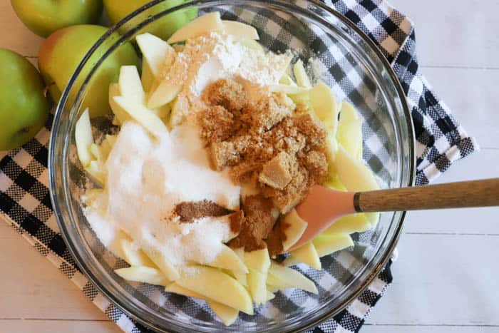 apples sliced in a mixing bowl