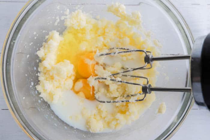 mixing ingredient in a clear bowl