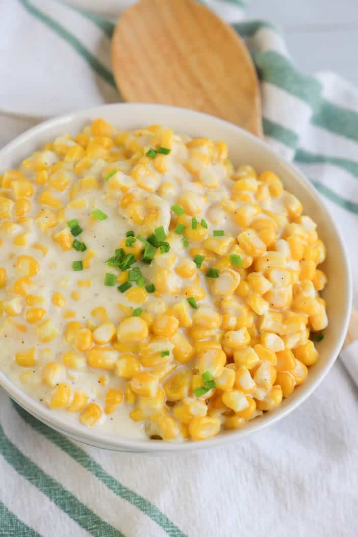cream corn in a white bowl