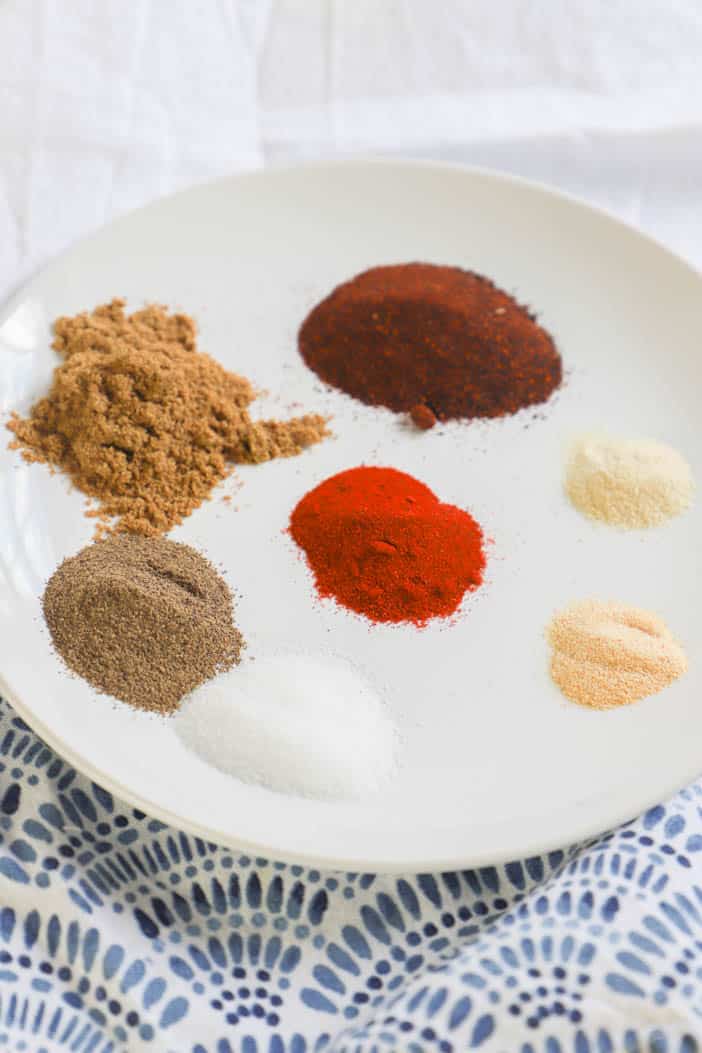 taco seasonings on a white plate