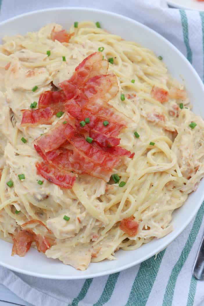 close up picture of Slow Cooker Chicken Bacon Ranch Pasta with chives