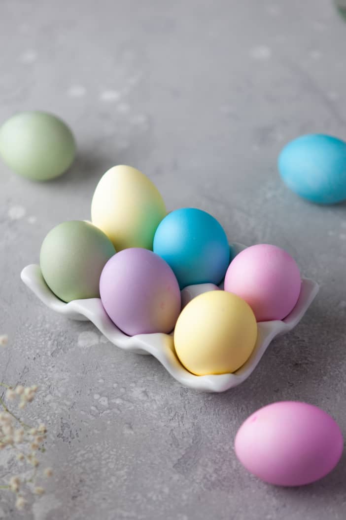 dyed Easter Eggs on egg tray.