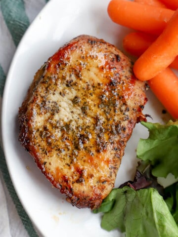 Air Fryer Pork Chops on a white plate