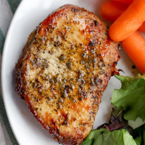 Air Fryer Pork Chops on a white plate