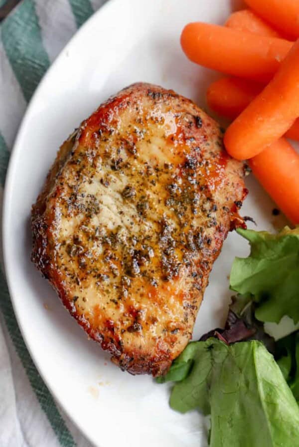 Air Fryer Pork Chops on a white plate
