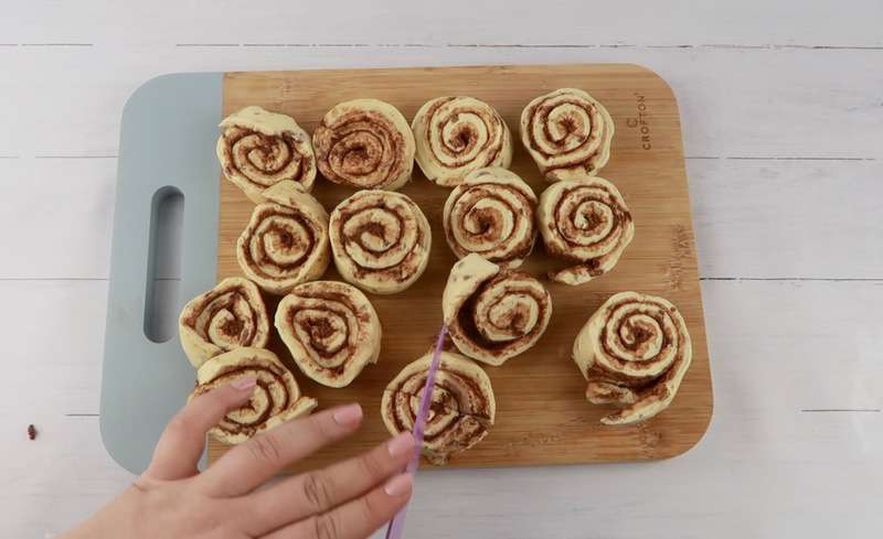 dicing cinnamon rolls for the muffins