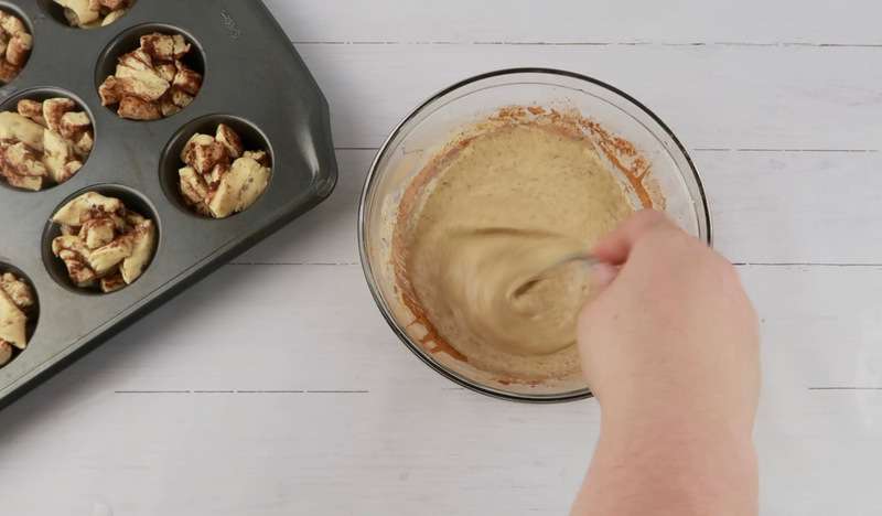 whisking eggs and cream and cinnamon for the muffins