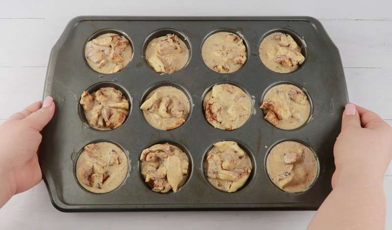 cinnamon roll muffins in muffin tin