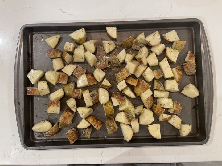 ranch potatoes on backing sheet before going in over