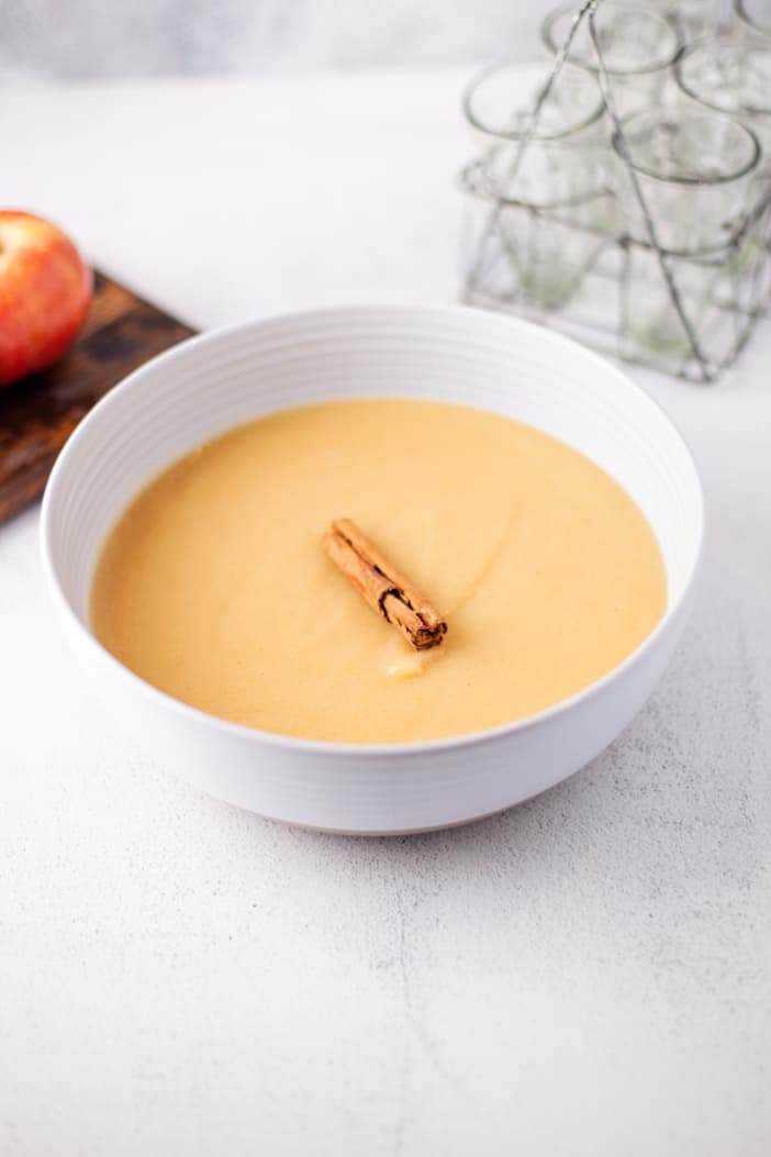 Slow Cooker Cinnamon Applesauce in a large white bowl