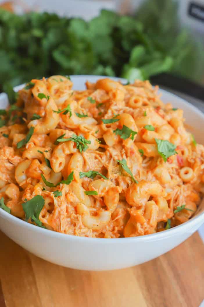 Slow Cooker Enchilada Pasta topped with fresh cilantro