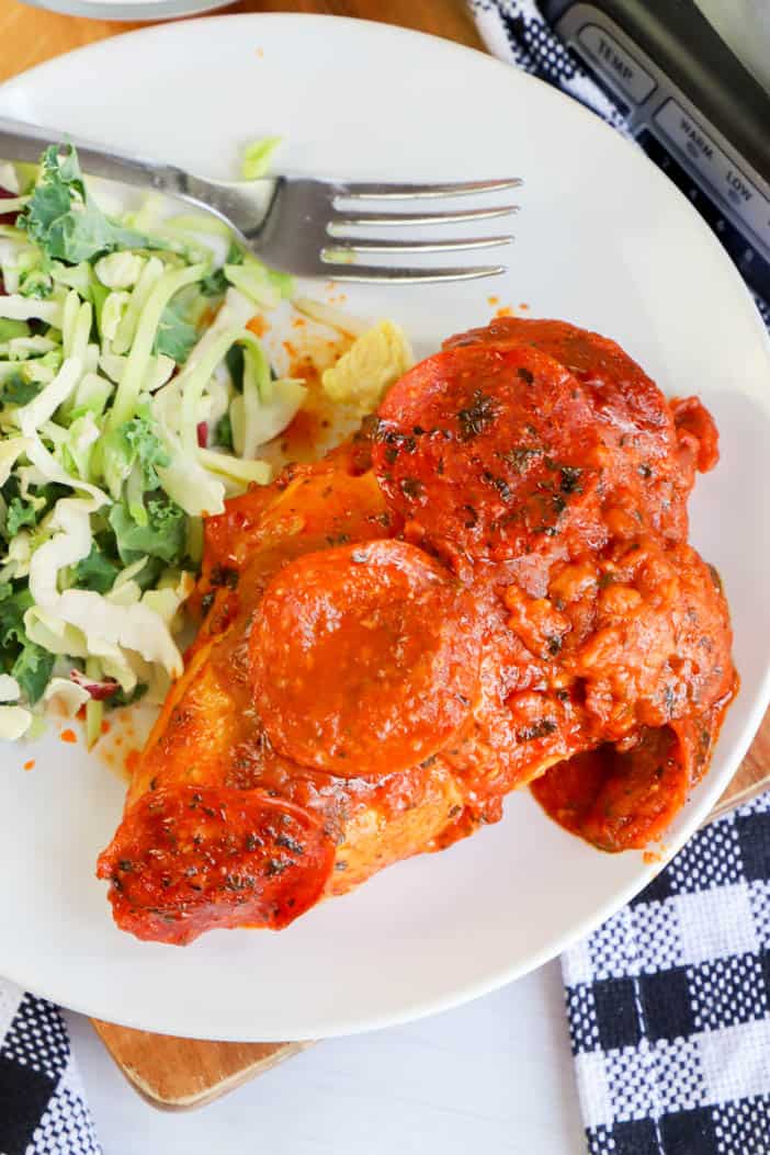 Slow Cooker Pizza Chicken on a plate with fork
