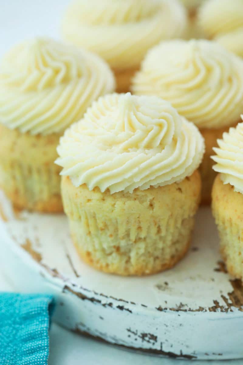 vanilla cupcakes on serving tray