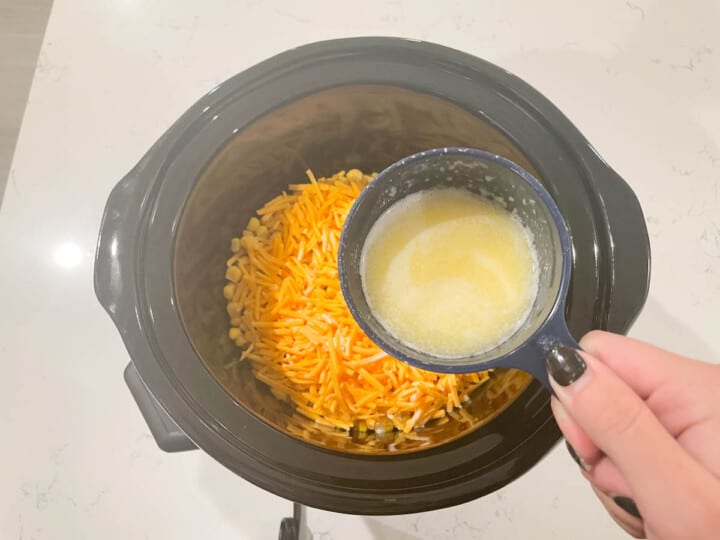 adding ingredients to the slow cooker