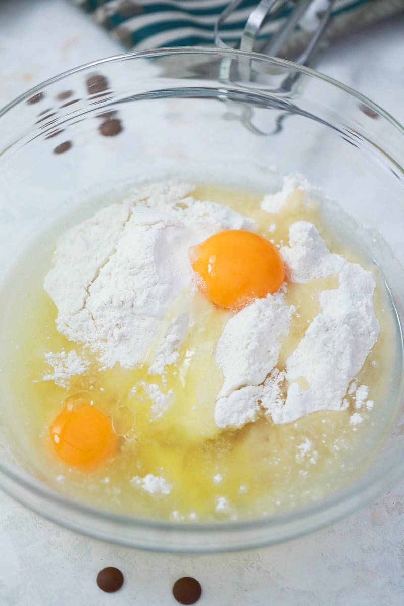 Mixing ingredients into a clear bowl