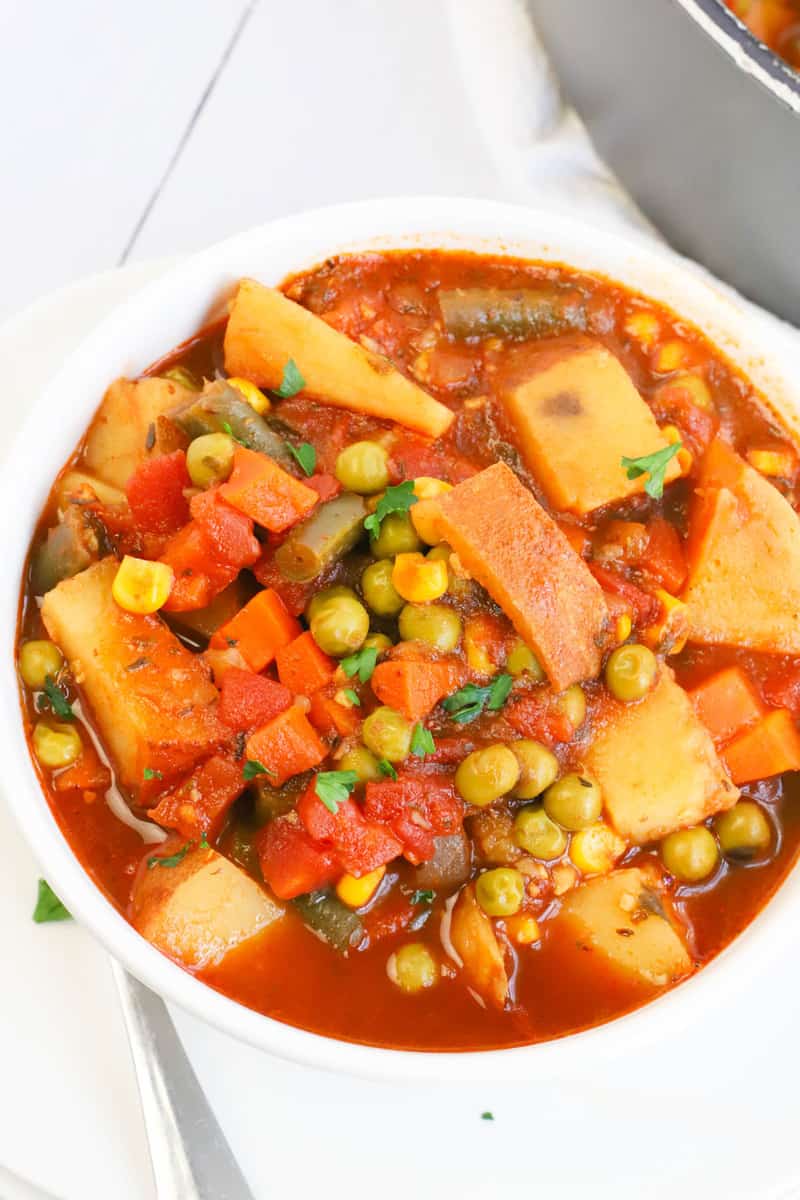 closeup of vegetable soup in a white bowl