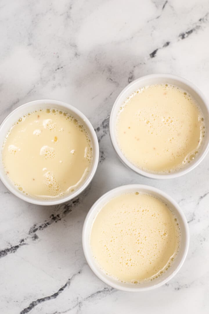 sweetened condensed milk and geltain mixed in white bowls
