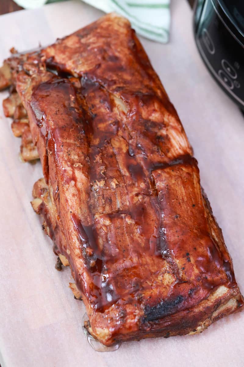Slow Cooker Ribs finished and on a cutting board
