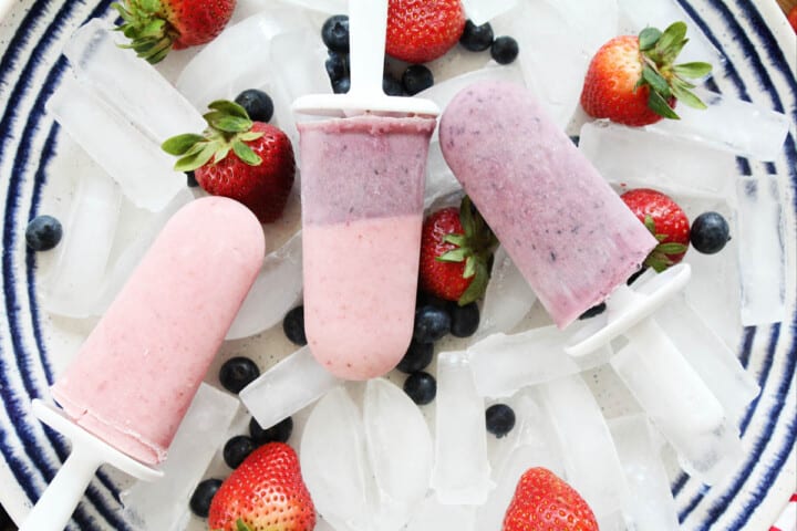serving the Yogurt Popsicles on a plate of ice.
