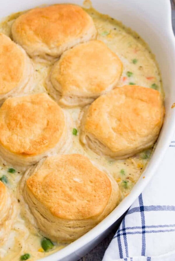 I love simple recipes like this Biscuit Chicken Pot Pie Casserole. It's classic comfort food made in casserole form. It doesn't get much better than that. I made a somewhat thicker version of the inside then places it on the bottom of a casserole dish.