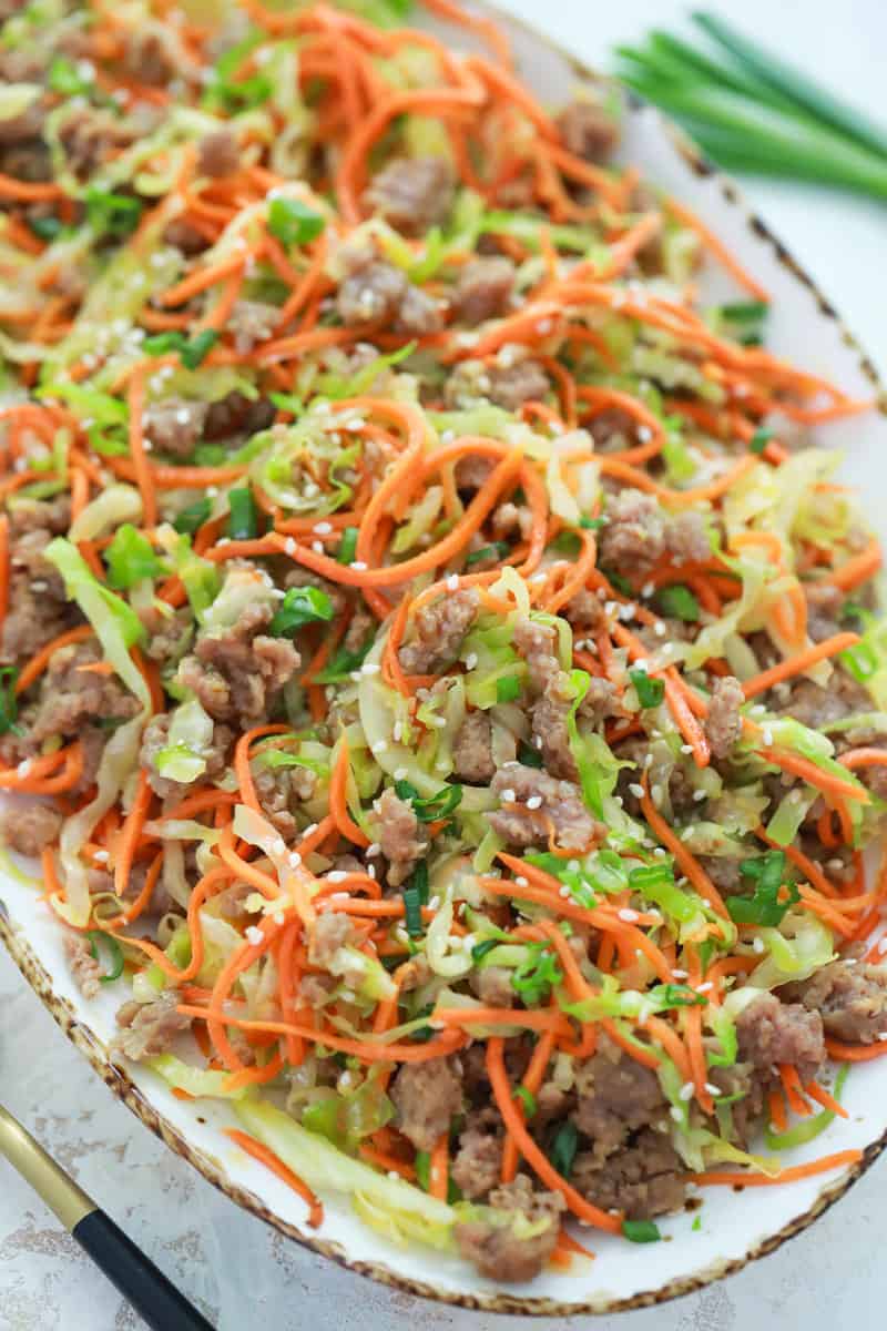 egg roll in a bowl on serving tray.