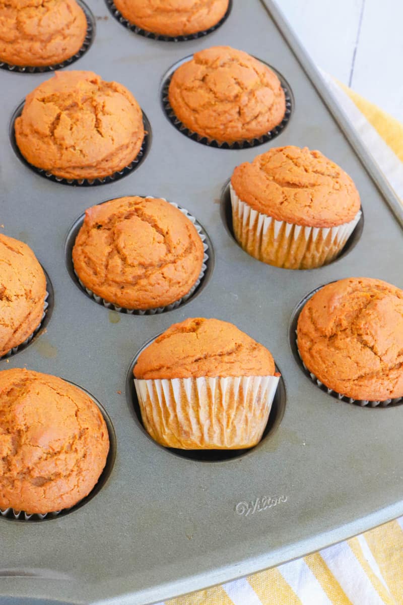 pumpkin pie muffins in a muffin pan