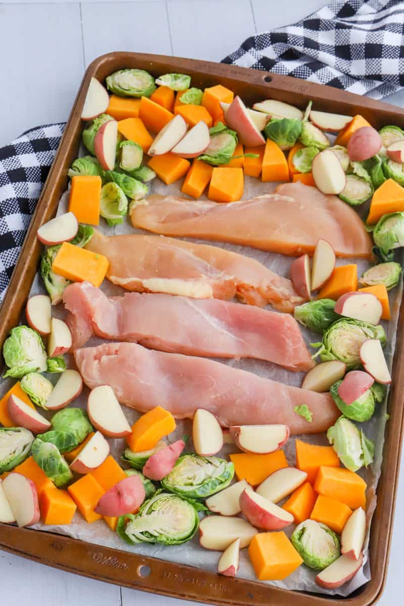 Autumn Chicken dinner on baking sheet before being baked