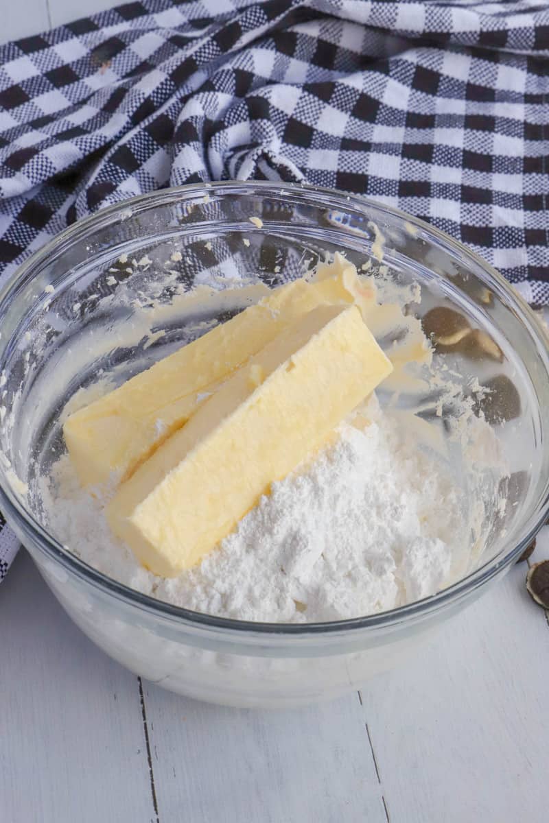 mixing sugar and butter for icing