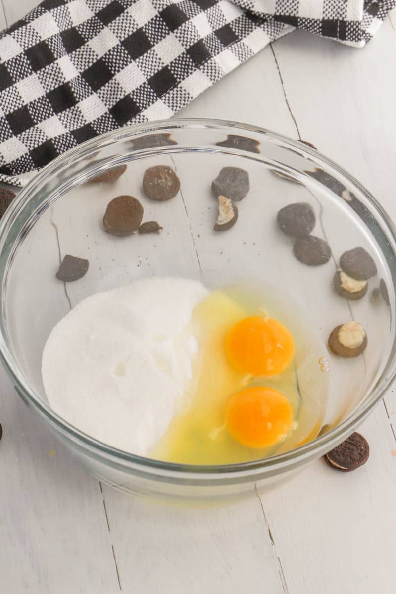 mixing together sugar and eggs