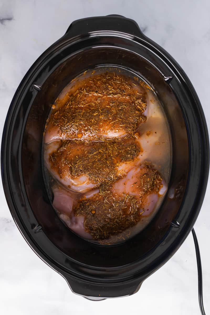 add seasoning to the turkey in the slow cooker