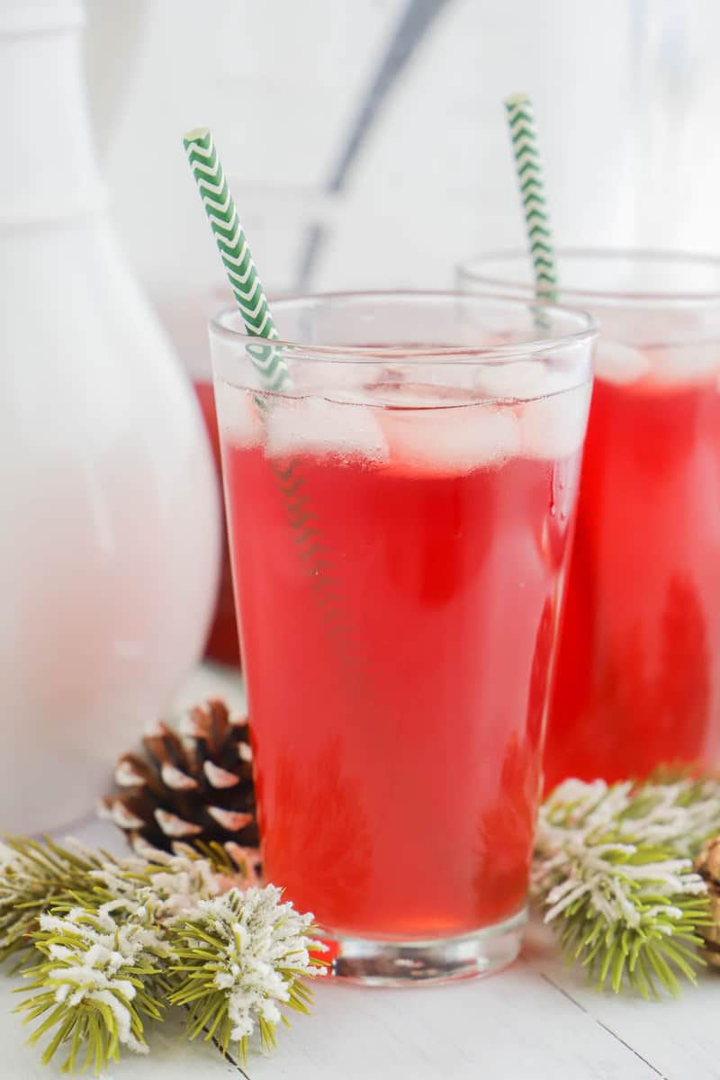 Christmas Punch in clear glass with striped straw